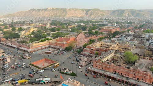 Jaipur, India: Aerial view of capital and largest city of Rajasthan, famous palace The Hawa Mahal, built from red and pink sandstone - landscape panorama of South Asia from above photo