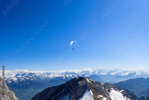 Paragliding in flight over the top