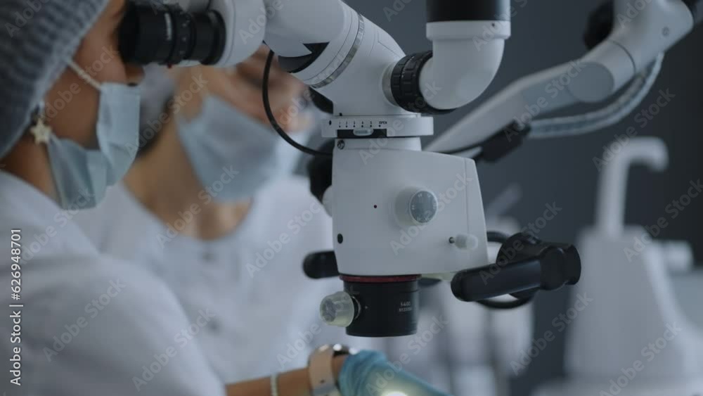 Health Professionals In Operating Room, Laparoscopic Operation With Using Surgical Microscope Health Professionals In Operating Room, Laparoscopic Operation With Using Surgical Microscope