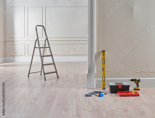 Renovate the house concept, paint and repair home, wall, stairs, spirit level and tool bag, classic background decoration.