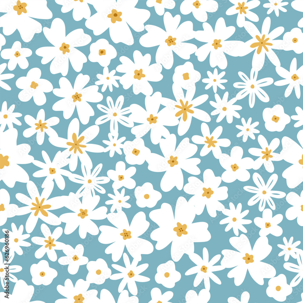 Delicate white flowers on a blue background. Simple and different flowers..Seamless pattern