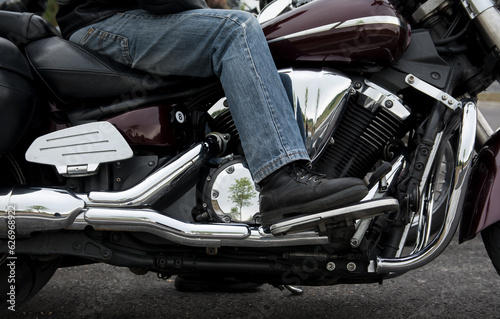 rider with leg on the motorbike