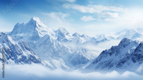 Foto Panoramic view of snowy mountains in the clouds. Winter landscape