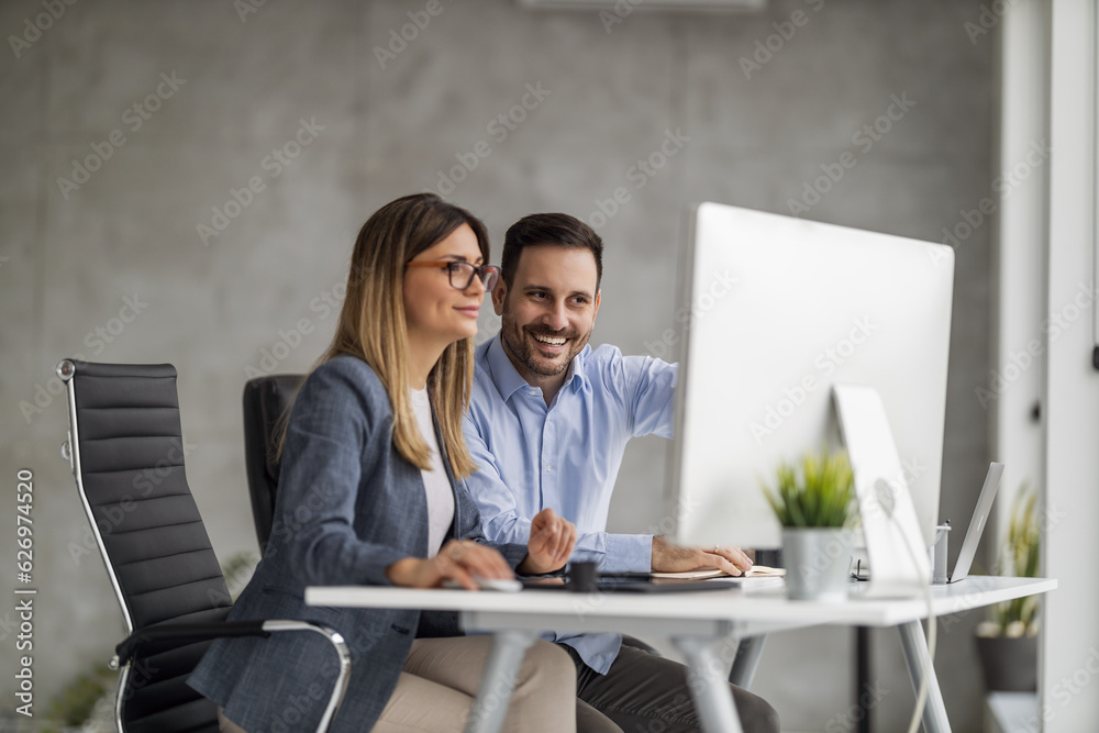 Web designers working at office and planning new website Web designers working at office and planning new website