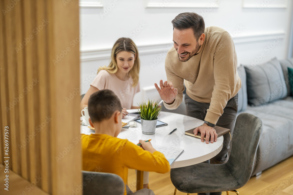Little boy watching lesson online and studying from home Little boy watching lesson online and studying from home