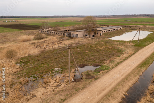 Drone photography of old abandoned and ruined rural building photo