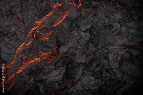 Murais de parede Aerial view of the texture of a solidifying lava field, close-up