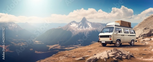 a van loaded with luggage on top of a mountain