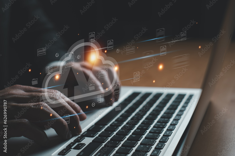 Naklejka premium Business person migrate data and corporate information into cloud technology for data security and back up as disaster recovery site and prevent for cyber crime. Data inventory for enterprise.