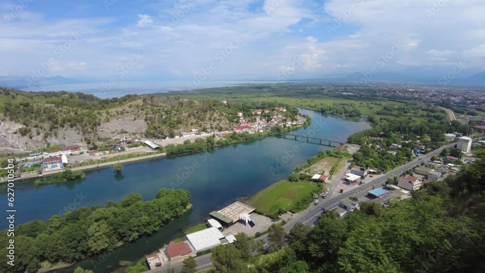 The panoramic views from the Rozafa castle's elevated position provide a breathtaking backdrop, showcasing the beauty of the Buna, Drin, and Kir rivers converging below in Albania. The panoramic views from the Rozafa castle's elevated position provide a breathtaking backdrop, showcasing the beauty of the Buna, Drin, and Kir rivers converging below in Albania.