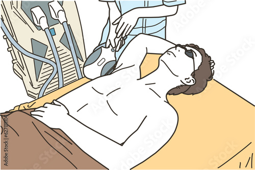脱毛の施術を受ける若い男性
