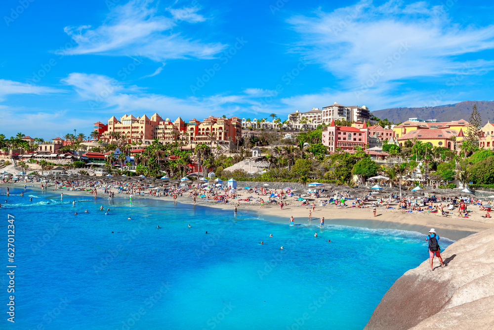 Panoramic view of El Duque beach on Adeje Atlantic coast in the summer vacation, in Spain Panoramic view of El Duque beach on Adeje Atlantic coast in the summer vacation, in Spain