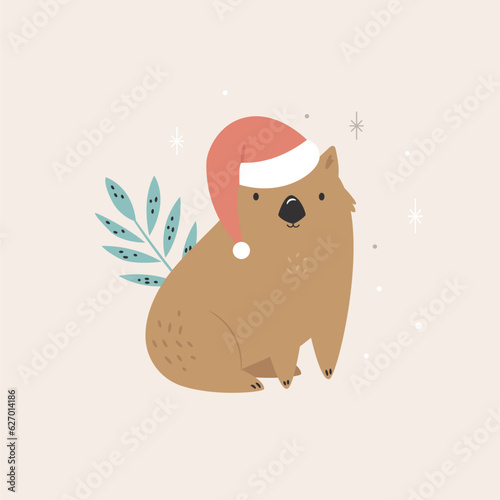 Christmas greeting card with funny wombat sitting in a Santa hat