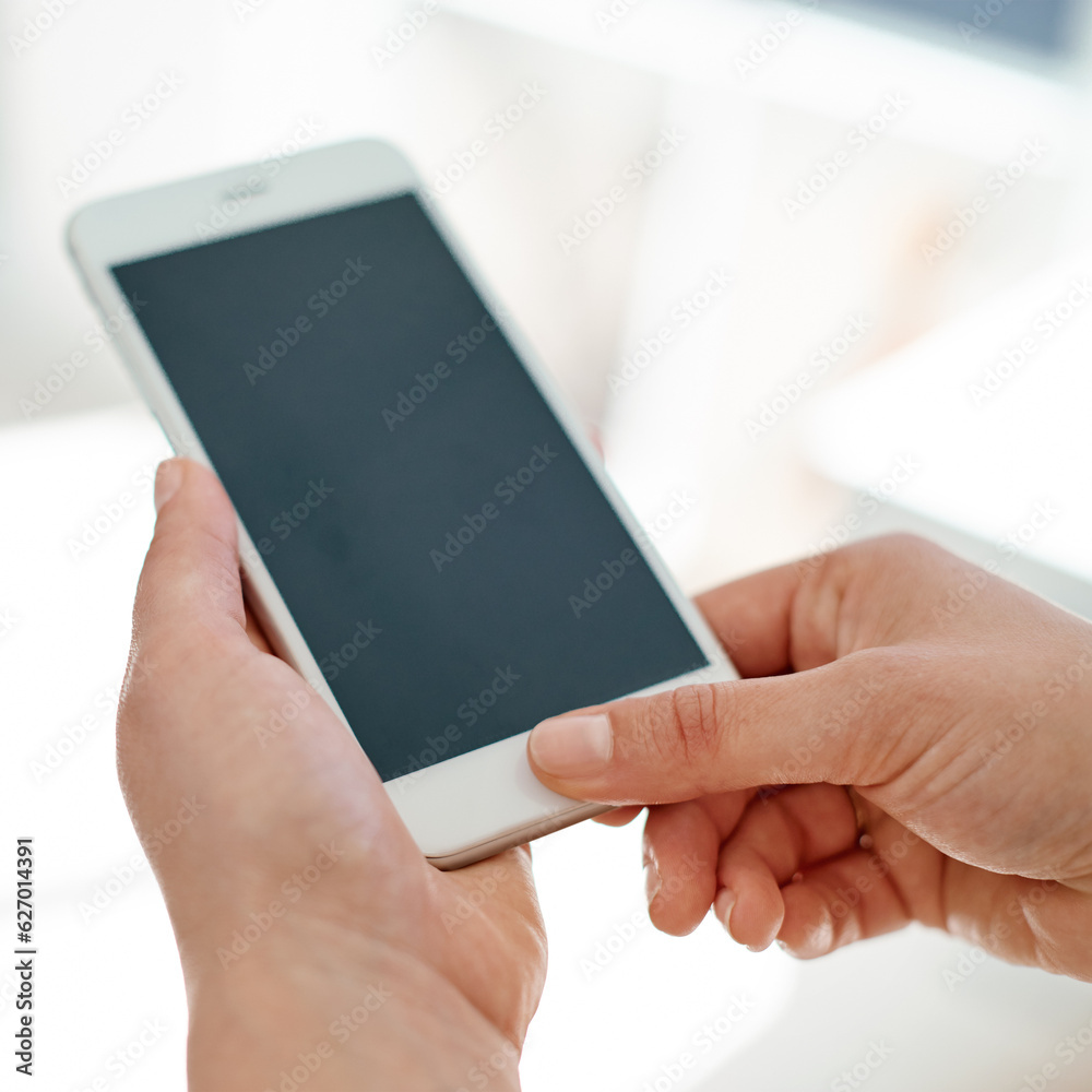 Instant messaging suits her business needs. Cropped shot of an unrecognizable businesswoman using her smartphone inside of an office.