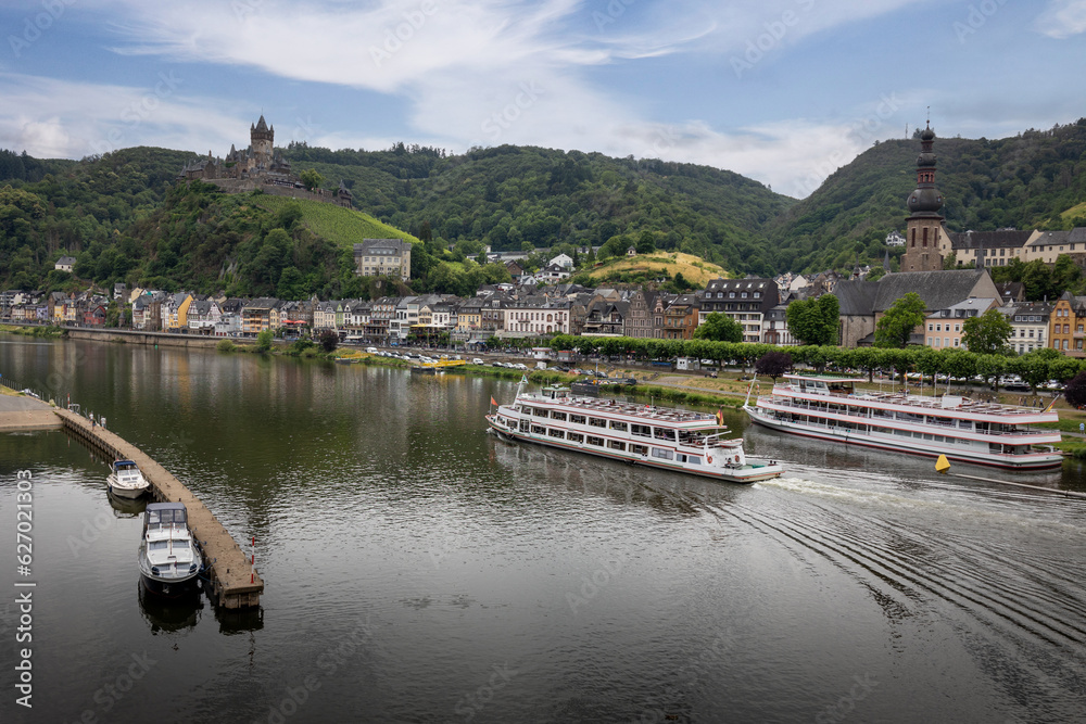 View on the German city of Cochem with the colored houses and the Reichsburg Cochem castle
