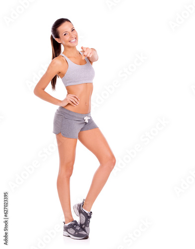 I can help you look like this. Portrait of an attractive and sporty young woman against a white background.