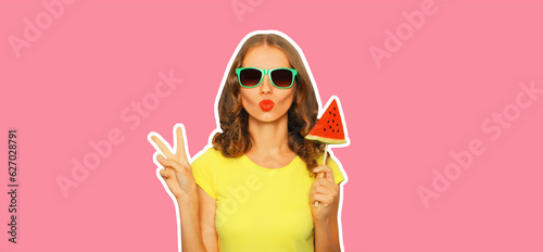 Summer portrait of stylish young woman with fresh juicy lollipop or ice cream shaped slice of watermelon wearing sunglasses on pink background
