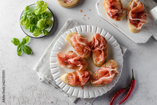 bruschetta with jamon and cheese photo