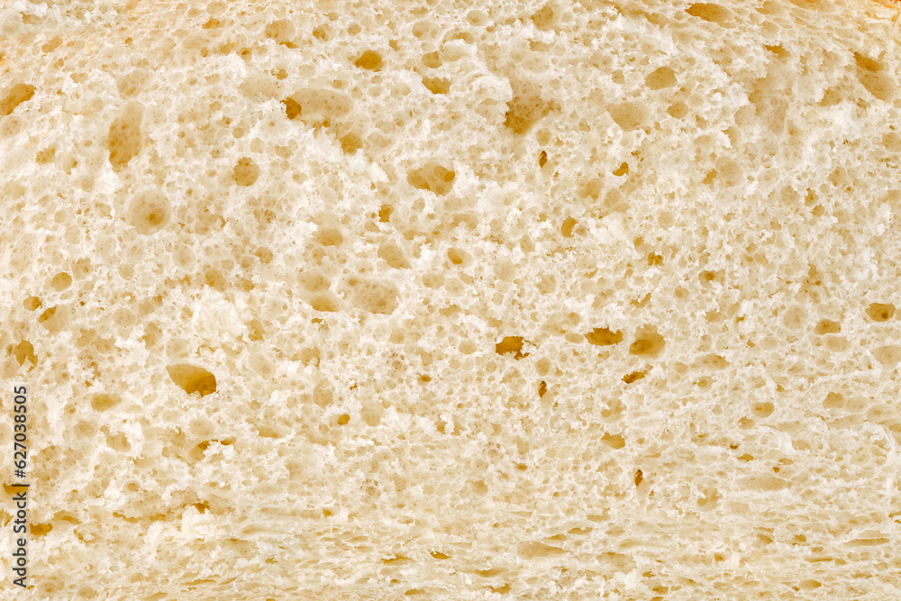 Bread, slice, inner part baked dough with pores close-up, background
