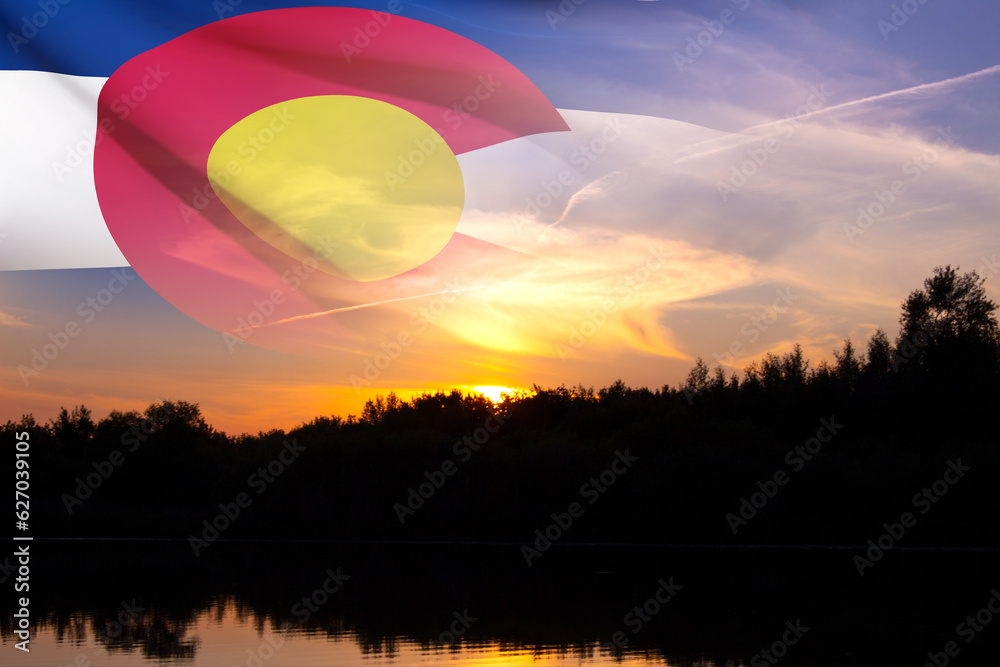 Flag of Colorado with transparency against the sunset Flag of Colorado with transparency against the sunset