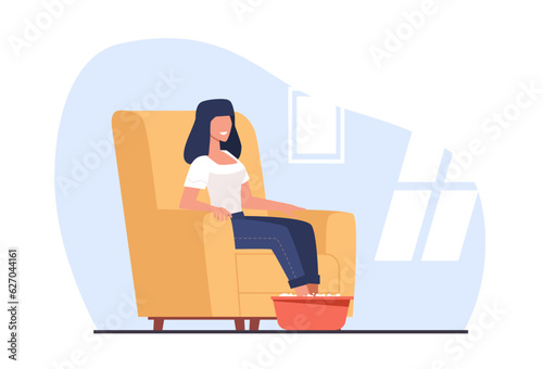 Woman sits in cushioned chair and does hot foot bath. Legs in hot water. Spa treatment. Home skincare and self care. Beauty and health procedures. Cartoon flat isolated vector concept