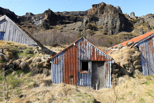 View of an abandoned house in the village of Kalfafell located in the south of Iceland photo