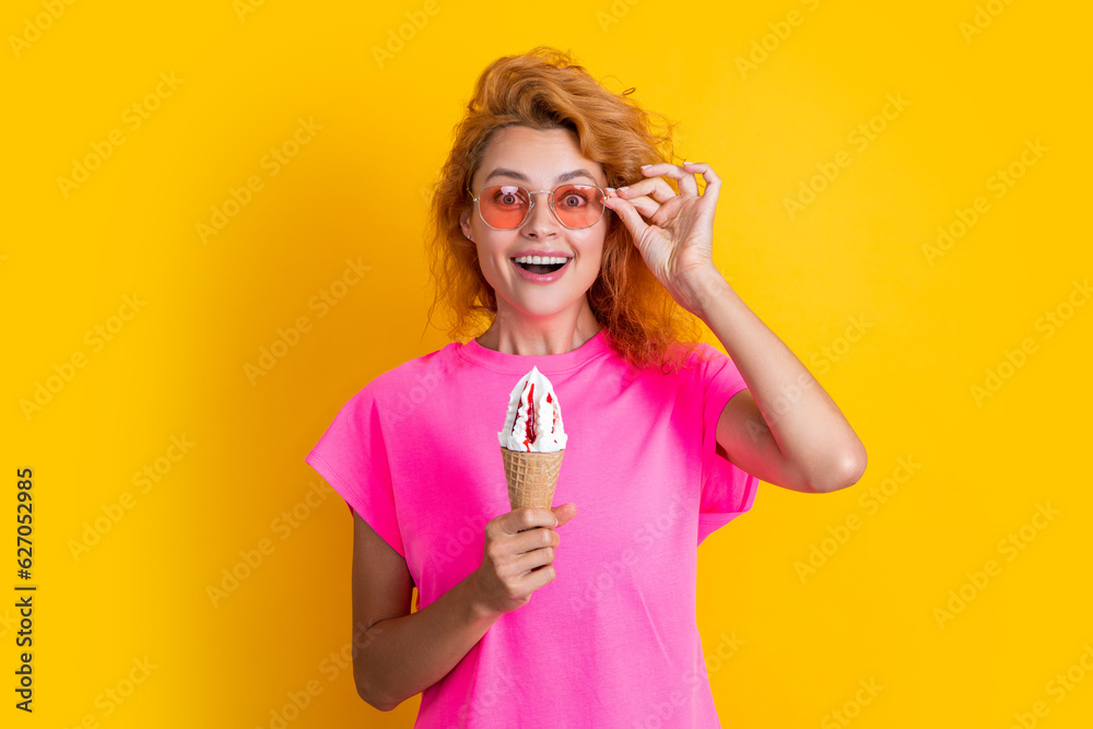 amazed summer woman with cone icecream isolated on yellow. summer woman amazed summer woman with cone icecream isolated on yellow. summer woman