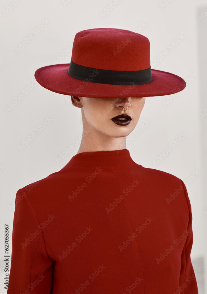 Makeup, fashion and mysterious woman in a studio with a glamour, face and beauty routine. Stylish, classy and female model with fancy hat for accessory with elegant style isolated by white background Makeup, fashion and mysterious woman in a studio with a glamour, face and beauty routine. Stylish, classy and female model with fancy hat for accessory with elegant style isolated by white background