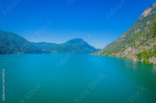 Aereal view of Lugano lake among mountains between Switzerland and Italy, beautiful panoramic landscape