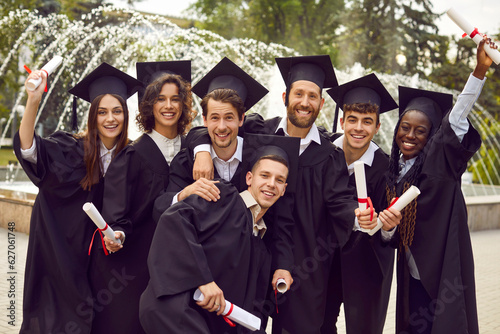 Billede på lærred Group photo of happy joyful diverse multiracial college or university graduate s
