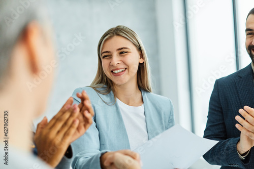 young business people meeting office businesswoman portrait happy smiling applause congratulating teamwork grouphappy smiling success applauding woman