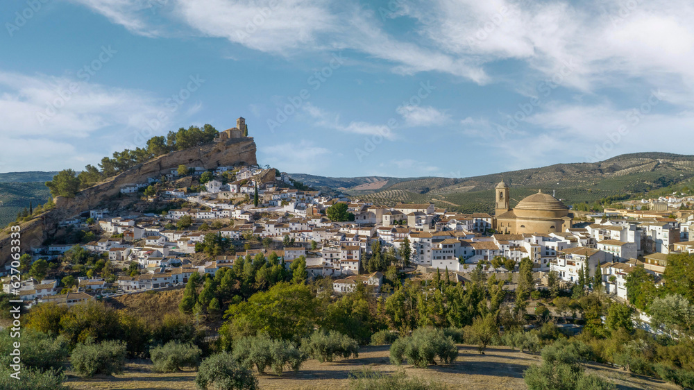 Montefrio. Panoramic aerial view of dome, white village and church on the cliff. One of the most beautiful views in the world according to National Geographic. Granada. Spain.