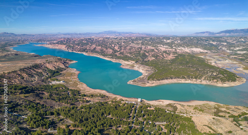 Reservoir at full capacity. Aerial view of a water reserve for human use. Water reserves for human consumption. Andalusia. Spain.