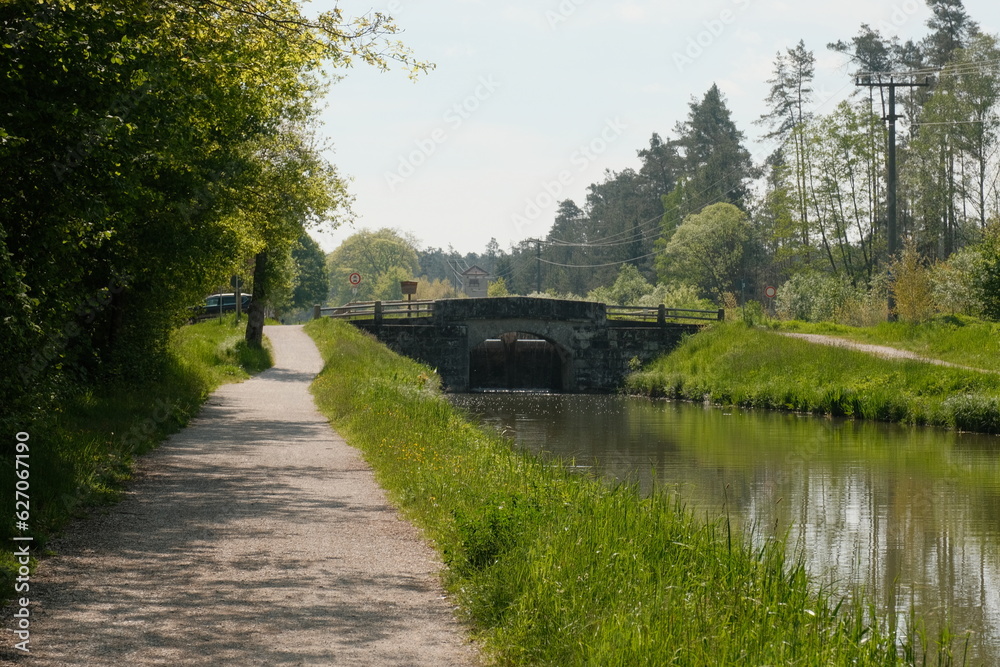 Sunny Canal-side Gravel Road in Germany