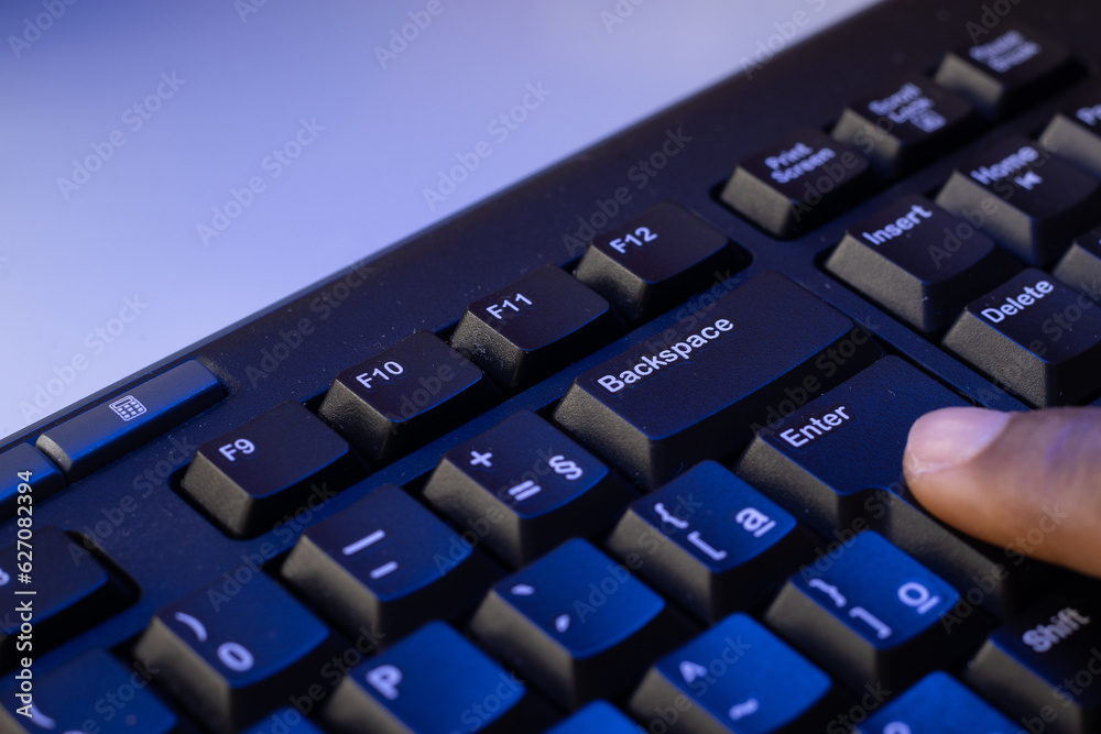 finger typing on a keyboard finger typing on a keyboard