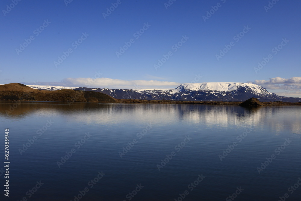 Mývatn is a shallow lake located in an area of active volcanism in northern Iceland, near the Krafla volcano