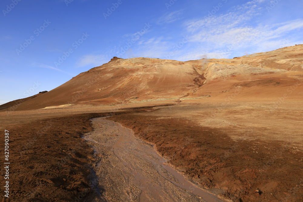 Hverarönd is a hydrothermal site in Iceland with hot springs, fumaroles, mud ponds and very active solfatares. It is located in the north of Iceland