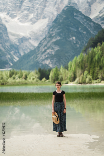 Beautiful female model at Lago di Landro in Italy, the dolomites