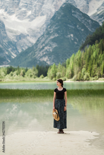 Beautiful female model at Lago di Landro in Italy, the dolomites