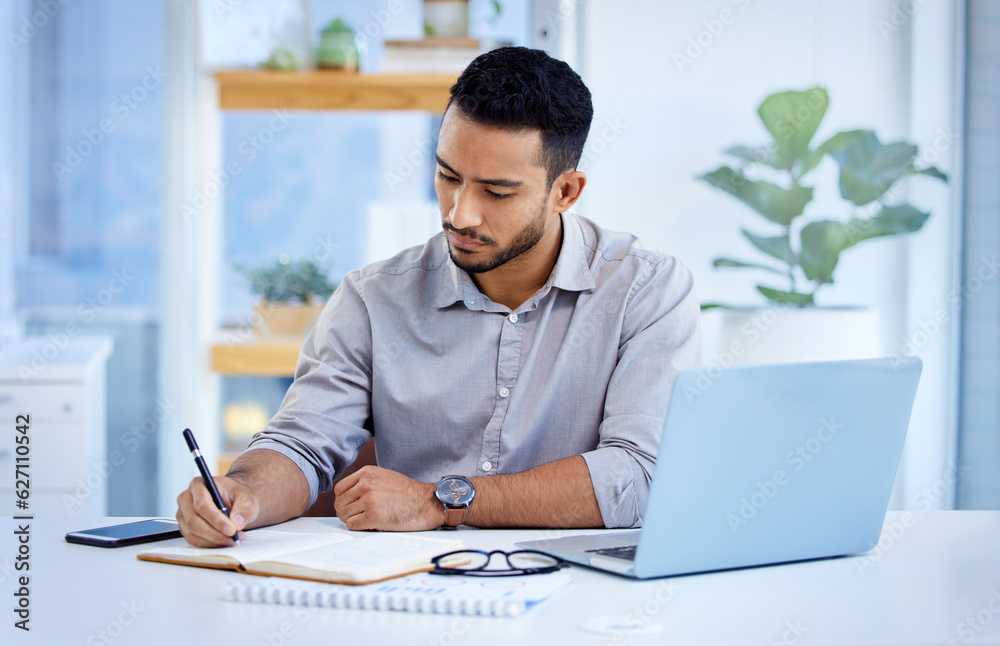 Young business man, writing and book with laptop, notes or schedule planning at web design job. Businessman, notebook and computer with ideas, brainstorming or problem solving for report in workplace Young business man, writing and book with laptop, notes or schedule planning at web design job. Businessman, notebook and computer with ideas, brainstorming or problem solving for report in workplace
