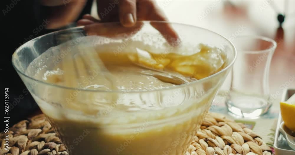 cake making, flour and cake mix are mixed