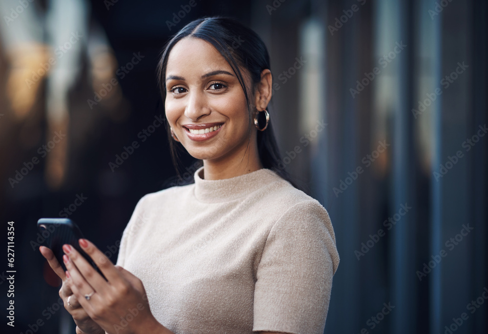Ive just gotta send this message quickly. Cropped portrait of an attractive young businesswoman sending a text while working in her office. Ive just gotta send this message quickly. Cropped portrait of an attractive young businesswoman sending a text while working in her office.