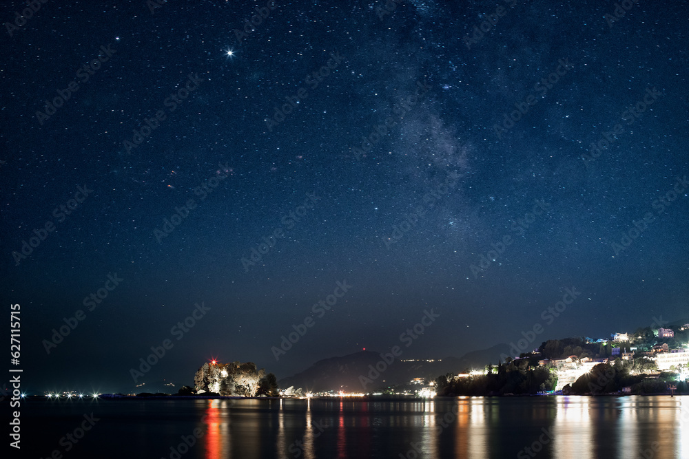 Starry night over Pontikonisi island in Corfu, Greece