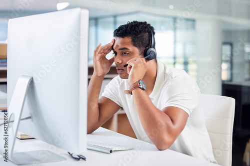 Stress, mistake and call center agent working on a crm online consultation in the office. Contact us, fail and upset male customer service or telemarketing consultant with a headset and computer. photo