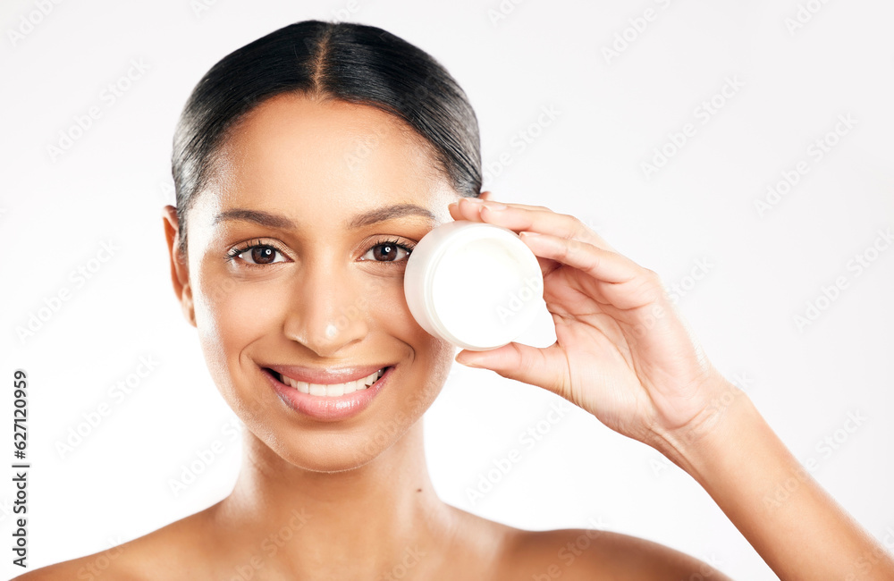 Happy woman, portrait and face cream for skincare, cosmetics or beauty against a white studio background. Female person with container, product or lotion and smile for dermatology or facial treatment Happy woman, portrait and face cream for skincare, cosmetics or beauty against a white studio background. Female person with container, product or lotion and smile for dermatology or facial treatment