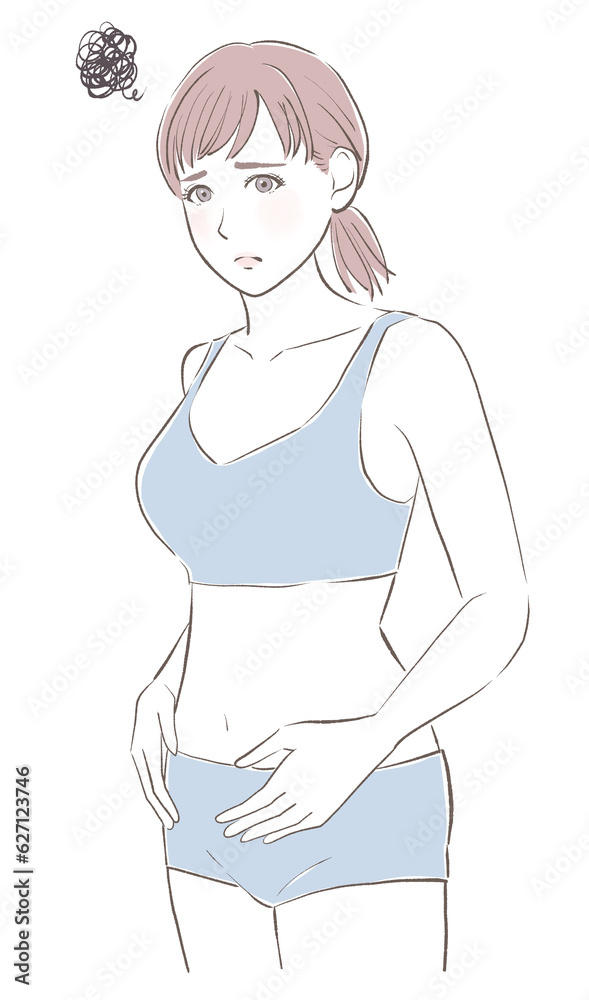 お腹に手を当てて悩む女性 お腹に手を当てて悩む女性