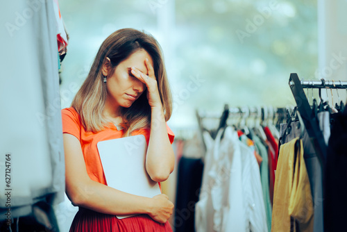Photography Unhappy Store manager Holding a PC Tablet feeling Depressed