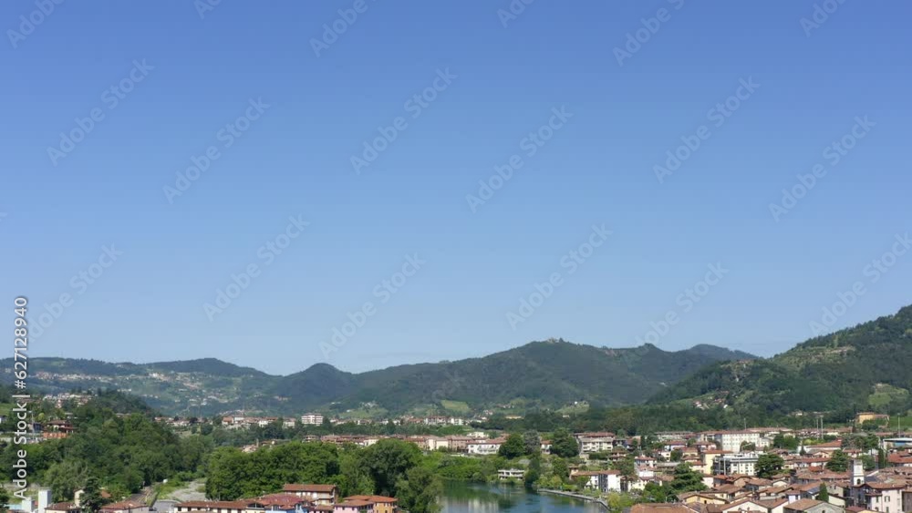 Lake Iseo And Italian Town In Summer - aerial drone shot Lake Iseo And Italian Town In Summer - aerial drone shot