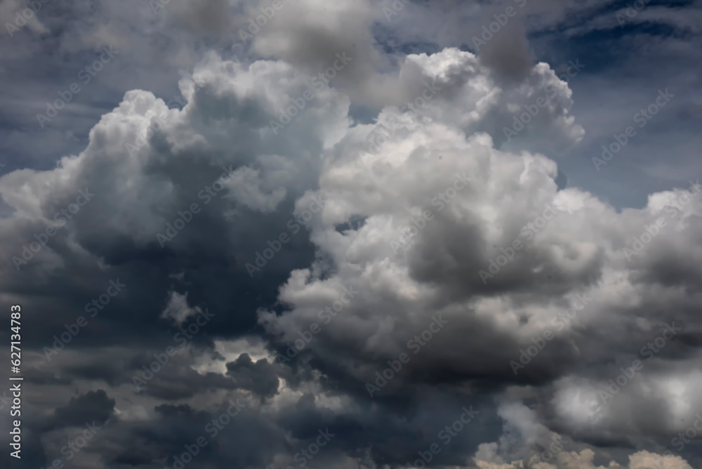 Obraz premium Dramatic dark storm thundercloud rain clouds on black sky background. Dark thunderstorm clouds rainny landscape. Meteorology danger windstorm disaster climate. Dark cloudscape storm disaster gray sky