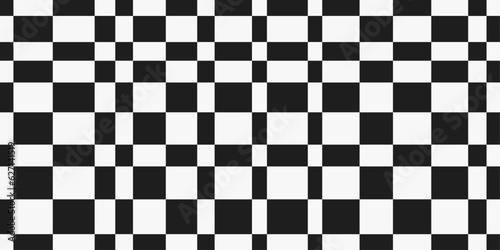 Chess pattern of uneven cells. Design for textile, fabric, clothing, curtain, rug, batik, ornament, background, wrapping.